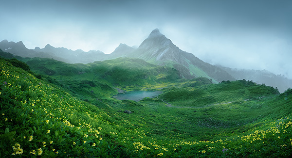 Landscape photographs shaped by natural light and terrain layers